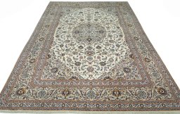 Surface texture of 2000s Kashan rug with natural Wool and intricate pattern
