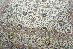 Close-up detail of 2000s Kashan rug from Iran / Persia showing Wool weave