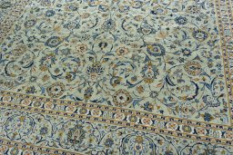 Close-up detail of 1970s Kashan rug from Iran / Persia showing Wool weave