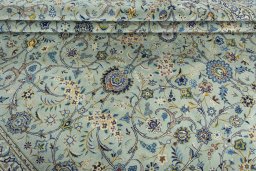 Close-up detail of 2000s Kashan rug from Iran / Persia showing Wool weave