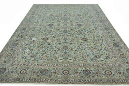 Surface texture of 2000s Kashan rug with natural Wool and intricate pattern