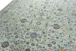 Backside of handmade 2000s Kashan rug showing knot structure and weave density