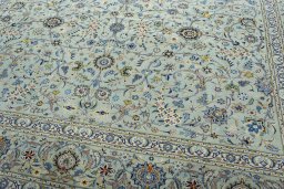 Close-up detail of 2000s Kashan rug from Iran / Persia showing Wool weave