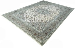 Corner detail of 2000s Kashan rug showing border pattern and Cork pile