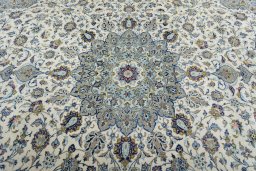Central medallion detail of 2000s Kashan rug from Iran / Persia