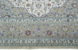 Full view of 2000s Kashan rug from Iran / Persia, 418 × 296 cm in Beige tones