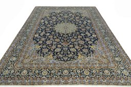 Surface texture of 2000s Kashan rug with natural Wool and intricate pattern