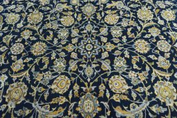Central medallion detail of 2000s Kashan rug from Iran / Persia