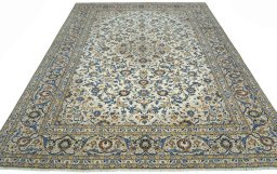 Surface texture of 2000s Kashan rug with natural Wool and intricate pattern