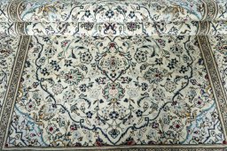 Close-up detail of 2000s Kashan rug from Iran / Persia showing Wool weave