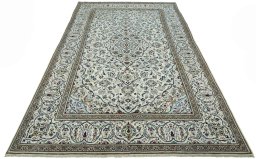 Surface texture of 2000s Kashan rug with natural Wool and intricate pattern