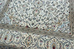 Close-up detail of 2000s Kashan rug from Iran / Persia showing Wool weave