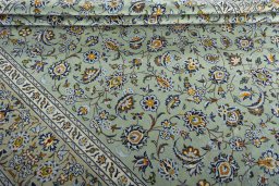 Close-up detail of 2000s Kashan rug from Iran / Persia showing Wool weave
