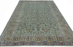 Surface texture of 2000s Kashan rug with natural Wool and intricate pattern