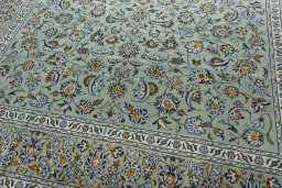Close-up detail of 2000s Kashan rug from Iran / Persia showing Wool weave