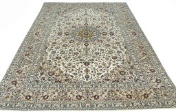 Surface texture of 2000s Kashan rug with natural Cork and intricate pattern