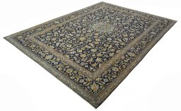 Corner detail of 2000s Kashan rug showing border pattern and Wool pile