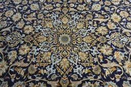 Central medallion detail of 2000s Kashan rug from Iran / Persia