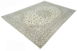 Corner detail of 2000s Kashan rug showing border pattern and Cork pile