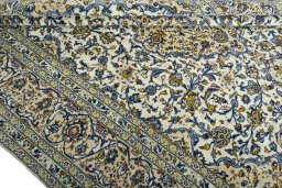 Close-up detail of 2000s Kashan rug from Iran / Persia showing Wool weave