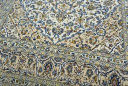 Close-up detail of 2000s Kashan rug from Iran / Persia showing Wool weave