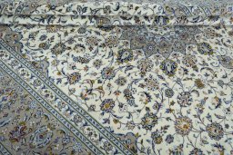 Close-up detail of 2000s Kashan rug from Iran / Persia showing Wool weave