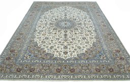 Surface texture of 2000s Kashan rug with natural Wool and intricate pattern