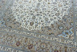 Close-up detail of 2000s Kashan rug from Iran / Persia showing Wool weave
