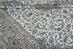 Close-up detail of 2000s Kashan rug from Iran / Persia showing Wool weave