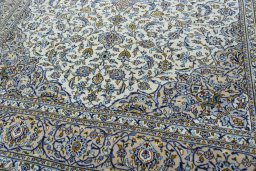 Close-up detail of 2000s Kashan rug from Iran / Persia showing Wool weave