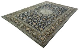 Corner detail of 2000s Kashan rug showing border pattern and Wool pile
