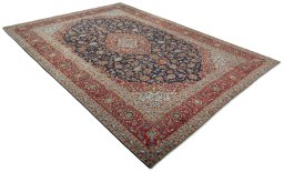 Close-up detail of 2000s Kashan rug from Iran / Persia showing Wool weave