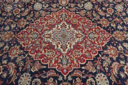 Central medallion detail of 2000s Kashan rug from Iran / Persia