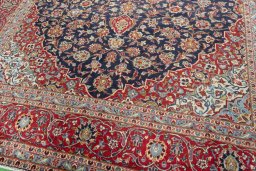Close-up detail of 2000s Kashan rug from Iran / Persia showing Wool weave