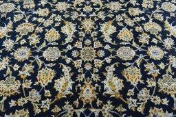 Central medallion detail of 2000s Kashan rug from Iran / Persia