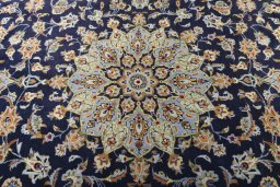 Central medallion detail of 2000s Kashan rug from Iran / Persia