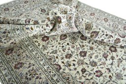 Surface texture of 2000s Kashan rug with natural Wool and intricate pattern