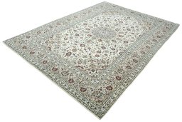 Corner detail of 2000s Kashan rug showing border pattern and Wool pile