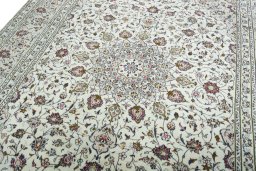 Backside of handmade 2000s Kashan rug showing knot structure and weave density