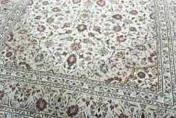 Close-up detail of 2000s Kashan rug from Iran / Persia showing Wool weave
