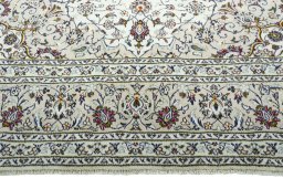 Full view of 2000s Kashan rug from Iran / Persia, 343 × 245 cm in Beige tones