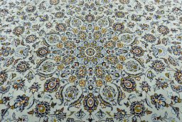 Central medallion detail of 2000s Kashan rug from Iran / Persia