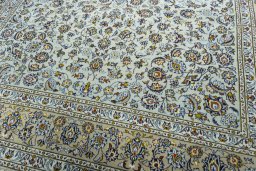 Close-up detail of 2000s Kashan rug from Iran / Persia showing Wool weave