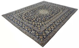 Corner detail of 2000s Kashan rug showing border pattern and Wool pile