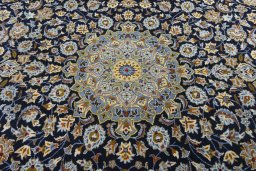Central medallion detail of 2000s Kashan rug from Iran / Persia