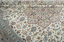 Close-up detail of 2000s Kashan rug from Iran / Persia showing Wool weave