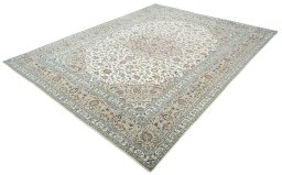 Corner detail of 2000s Kashan rug showing border pattern and Wool pile