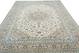 Surface texture of 2000s Kashan rug with natural Wool and intricate pattern