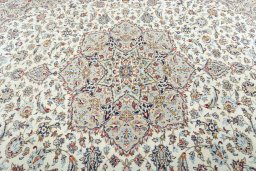 Central medallion detail of 2000s Kashan rug from Iran / Persia