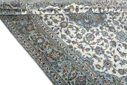 Close-up detail of 2000s Kashan rug from Iran / Persia showing Wool weave